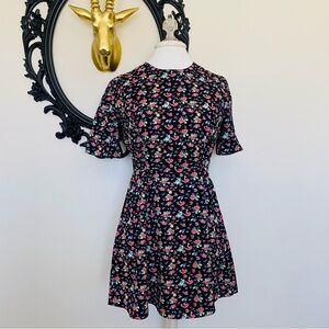Valencia & Vine Black Short Sleeve Babydoll Dress with Bright Floral Print